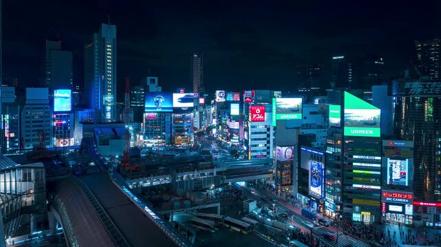 Timelapse video of Shibuya crossing at night.