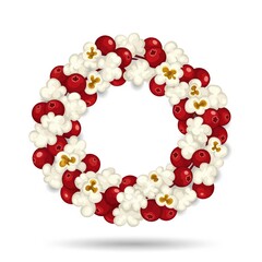 Obraz premium Creative holiday wreath made of popcorn and red berries for festive decor