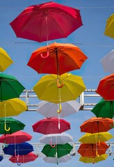 colorful umbrellas on white background