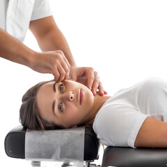 chiropractor adjusts a woman’s neck alignment during treatment