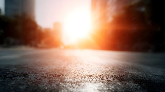 Intense sunlight creates a shimmering heat haze over a wet city street