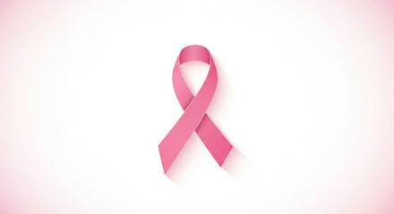 A single pink ribbon symbol of breast cancer awareness isolated on a soft white and pink gradient background