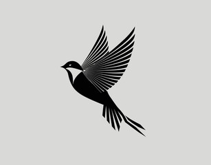 A black silhouette of a bird in flight with outstretched wings against a light grey background