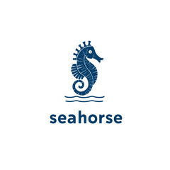 Navy seahorse with crest of spines floating atop two gentle waves © azi