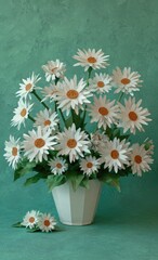 A still life arrangement of meticulously crafted paper daisies in a white pot, against a teal background, exuding a serene and delicate mood.