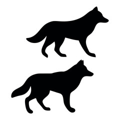 Two black silhouettes of standing wolves on a white background