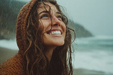 Smiling Woman Standing by Waterfall on Rainy Day