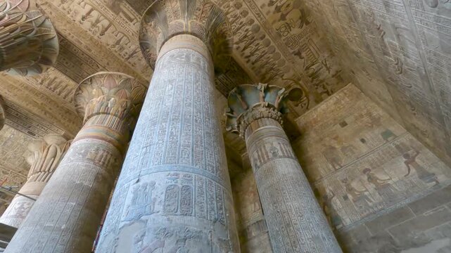Hieroglyphic carvings on an ancient egyptian temple column