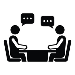 Two people discussing ideas sitting at a table with speech bubbles representing conversation silhouette