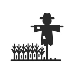 Obraz premium Silhouette of scarecrow in cornfield icon - simple black and white design