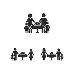 Fototapeta premium Family enjoying holiday meal together at dinner table