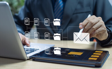 Email marketing concept with businessman sending and receiving digital newsletters managing direct...