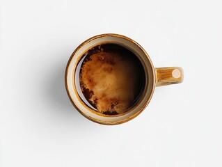 Overhead view of dark brown mug of coffee. Minimalist composition with clear and simple aesthetics.