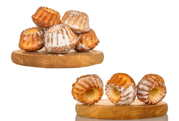 Sweet homemade cupcakes isolated on white background, close-up.