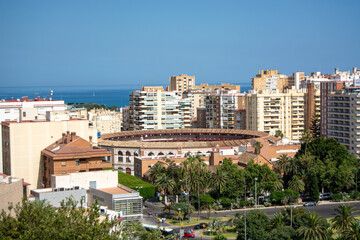 Aerial view of a bullring in a coastal city