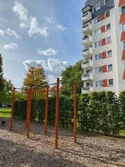 Fototapeta premium Outdoor Fitness Area in urban Green Space Near Residential building 