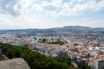 Panoramic Cityscape with Mountain Backdrop