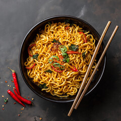 Asian spicy noodles in bowl