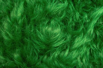 Synthetic emerald fur with a soft, fluffy texture for backgrounds