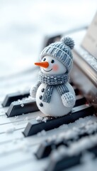 Musical Winter A Cheerful Snowman Figurine Wearing Hat and Scarf Sits Atop the Keys of Piano