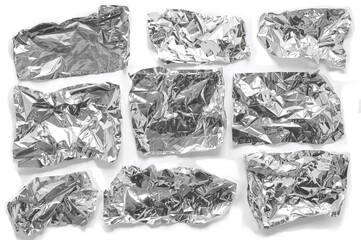 Naklejka premium Set and assortment of aluminum foil tape strips isolated on white background with clipping path, overhead perspective
