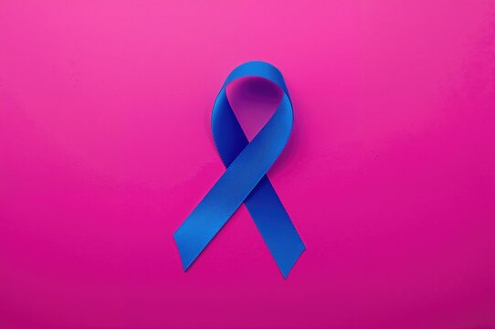 Blue ribbon symbolizing awareness for colorectal cancer, acute respiratory distress syndrome, juvenile arthritis, apraxia, and tuberous sclerosis on a background with clipping path