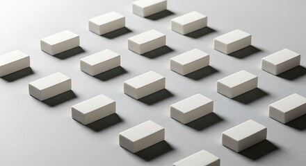 Minimalist Arrangement of White Prisms Creating Rhythmic Pattern