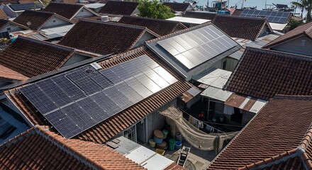Rooftops of a coastal village adorned with solar panels, showcasing a blend of traditional housing and modern renewable energy solutions.