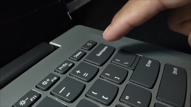pressing the backspace key on the keyboard