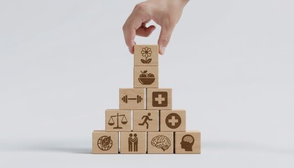 Building Blocks of Wellness: A hand carefully stacks wooden blocks illustrating aspects of wellbeing in a visually appealing and symbolic manner. 