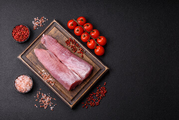 Raw pork tenderloin, fresh meat, a source of protein, and an ingredient for a meal. Pork tenderloin