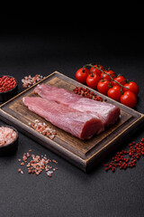 Raw pork tenderloin, fresh meat, a source of protein, and an ingredient for a meal. Pork tenderloin