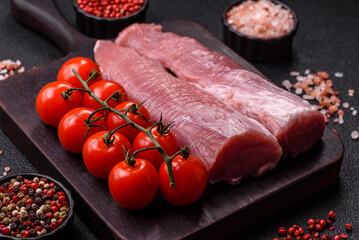 Raw pork tenderloin, fresh meat, a source of protein, and an ingredient for a meal. Pork tenderloin