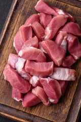 Raw pork, sliced, fresh meat, a source of protein, and an ingredient for a hearty meal. Raw pork