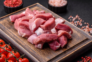 Raw pork, sliced, fresh meat, a source of protein, and an ingredient for a hearty meal. Raw pork