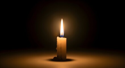 A burning candle with soft golden light as a sign of peace