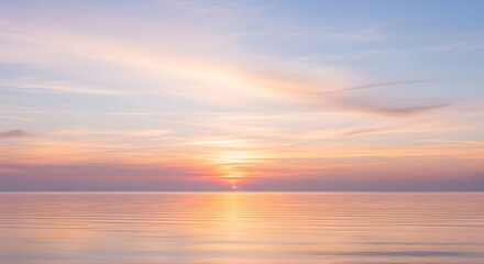 Naklejka premium Sunrise over ocean symbolizing hope and peace