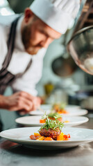 a single chef plating a dish, chef in focus, kitchen background blurred; bright neutral tones. 