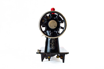 Obraz premium black vintage sewing machine on white background
