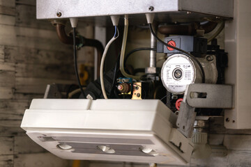 An open electric water heating boiler, ready for repair.