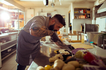 Chef preparing food in kitchen