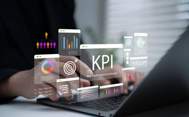 Businessman analyzing KPI dashboard with charts and data analytics on laptop, representing performance measurement, business strategy, goal tracking, digital marketing and corporate growth