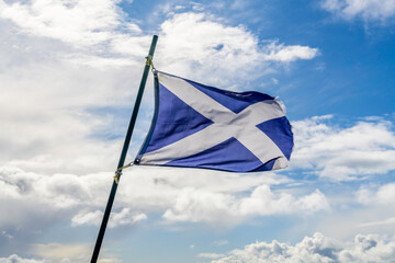 Flag of Scotland with St Andrew's Cross waving in the Wind