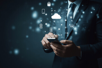 Businessman using mobile with digital cloud, security icons floating above. Represents cloud computing, data protection in digital world.