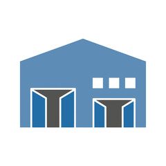 Blue industrial building with two large open doors and small windows, representing a warehouse or factory.