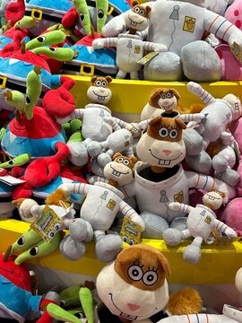 Antalya, T&uuml;rkiye - September 12 2025: Showcase with stuffed animals. Vertical. Mr. Krabs and Sandy Cheeks