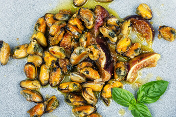 Fried seafood on a plate, mussels.