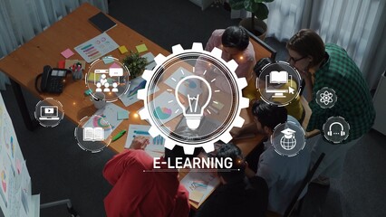 A dynamic e-learning session captures a diverse group collaborating over digital tools, enhancing professional skills and fostering innovative ideas in a modern workspace. Raster