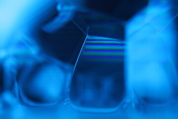 Blue liquid surface, oil stains movement, bright chemistry, surreal background, arctic blue colour, water surface, ink and water