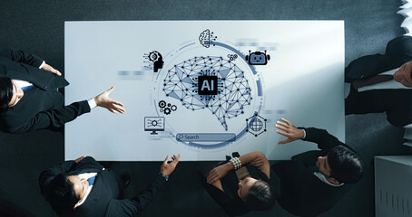A business team engages in a collaborative discussion surrounding artificial intelligence concepts in a modern office setting, with visualizations representing technology and data analysis. Trope